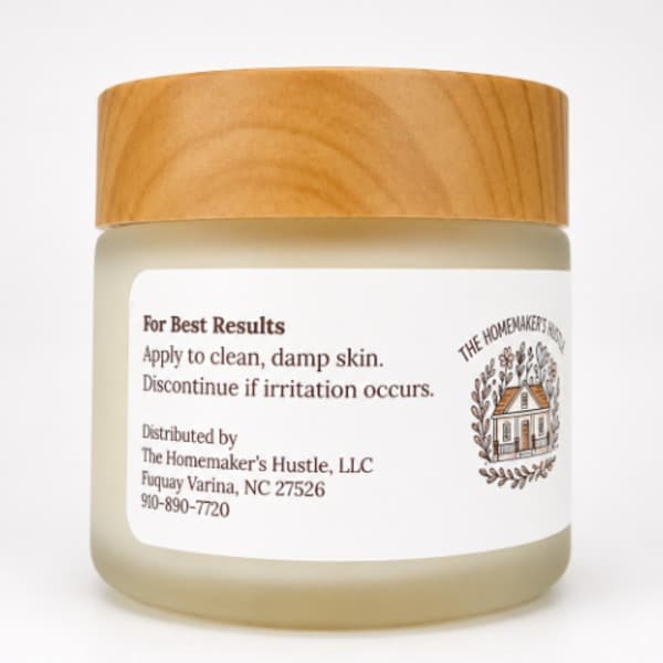 Application view of a frosted jar with a wood grain lid and white label containing frankincense resin and castor oil tallow balm